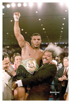 Dieci anni prima, nel 1986, Tyson conquista il suo primo titolo mondiale e, a soli vent'anni, diviene il più giovane campione nei pesi massimi