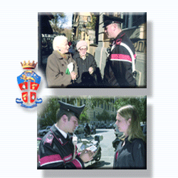 made up of two photos showing a district Carabiniere giving information to the citizens.